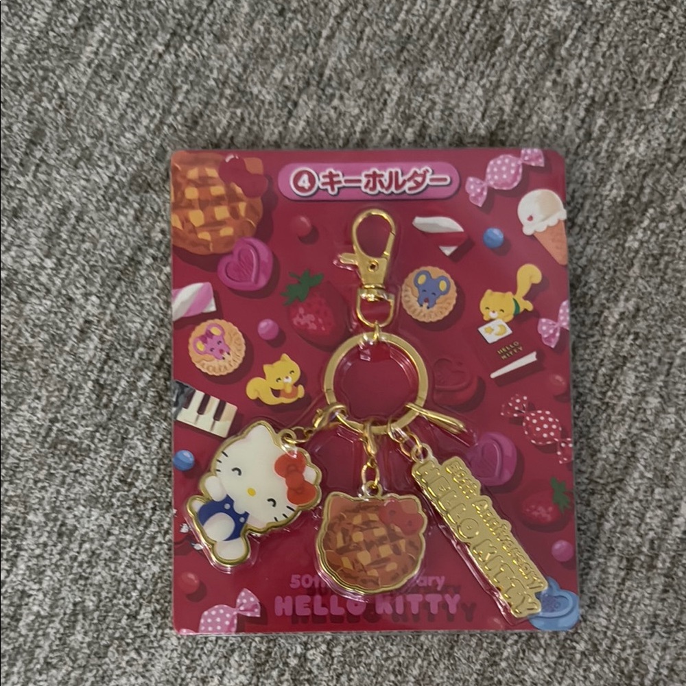 Hello Kitty 50th Anniversary Gold Charm Keychain